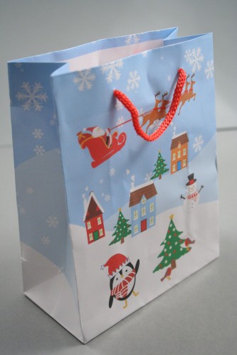 Christmas Scene Glossy Gift Bag with Blue Background and Red Cord Handles. Approx Size 15cm x 12cm x 6cm
